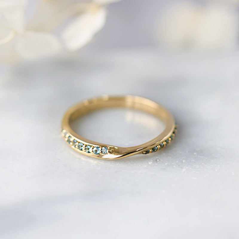 Fairtrade Yellow Gold Aquamarine Twist Eternity Ring - Jeweller's Loupe