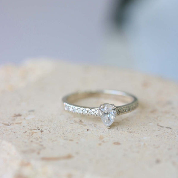 Ethically-sourced Platinum Pear Cut Diamond Engagement Ring with Diamond Set Shoulders - Jeweller's Loupe