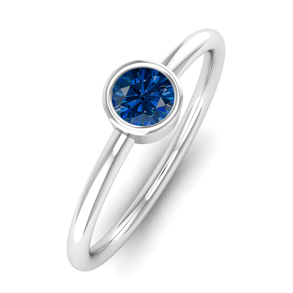 Fairtrade White Gold Solitaire Sapphire September Birthstone Ring, Jeweller's loupe