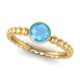 Fairtrade Gold FAITH Blue Topaz Stacking Ring - Jeweller's Loupe