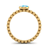 Fairtrade Gold FAITH Blue Topaz Stacking Ring - Jeweller's Loupe