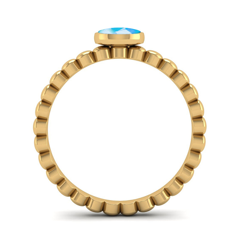 Fairtrade Gold FAITH Blue Topaz Stacking Ring - Jeweller's Loupe