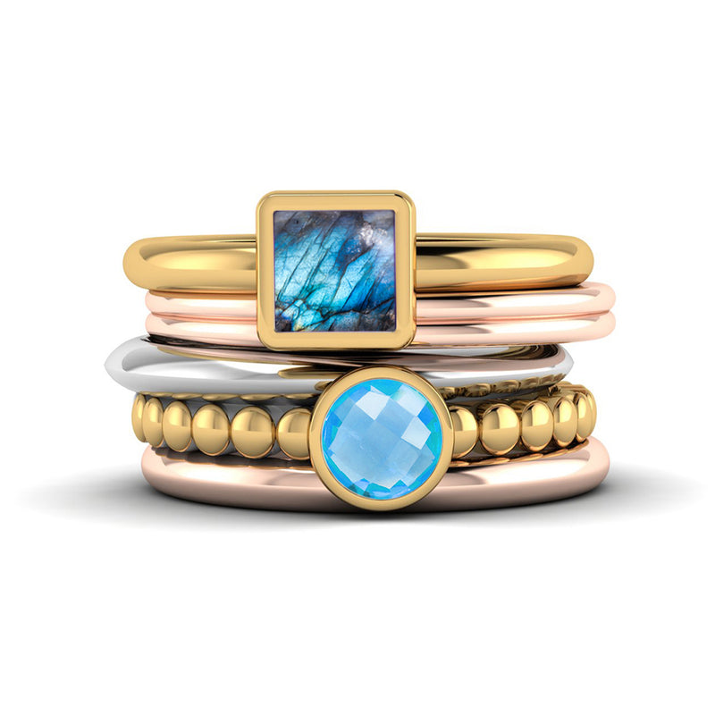 Fairtrade Gold FAITH Blue Topaz Stacking Ring - Jeweller's Loupe